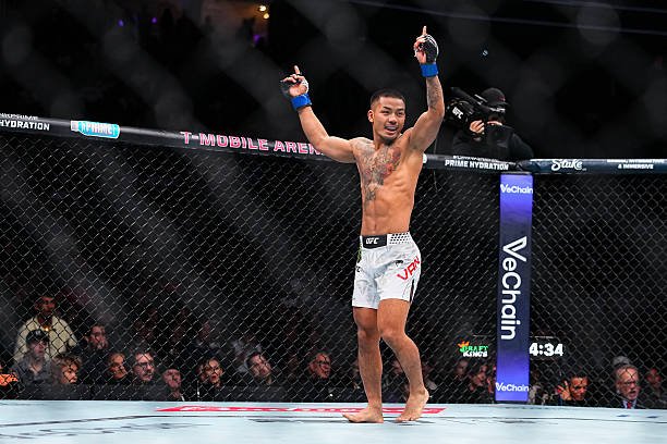 Joshua Van celebrates his victory at UFC 323