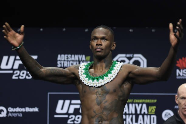 Israel Adesanya poses during the ceremonial weigh-in for UFC 293